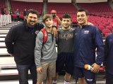 Lemoore Coach Marcio Botelho, a former Bulldog wrestler, with (left to right) Gary Joint, Isaiah Martinez, and Angel Solis following Friday's Fresno State wrestling match at the Save Mart Arena.